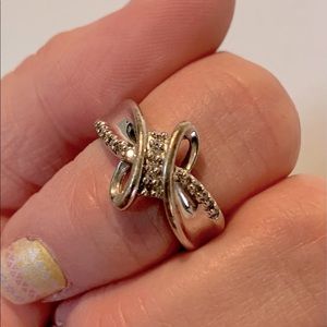 Sterling Silver Swirl ring with diamond accents.